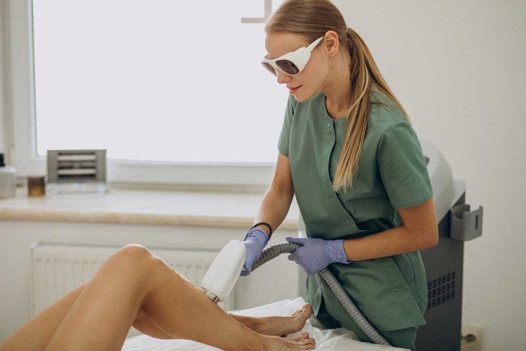 Professional laser hair removal treatment on the legs using advanced laser technology in a specialist aesthetic clinic.
